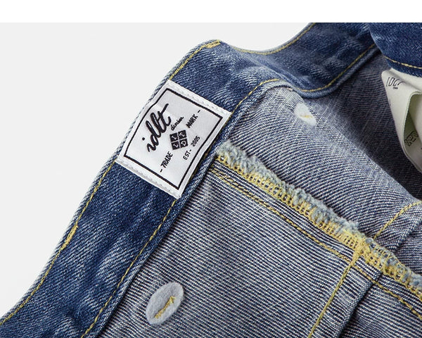 IDLT jeans, washed blue inner label.
