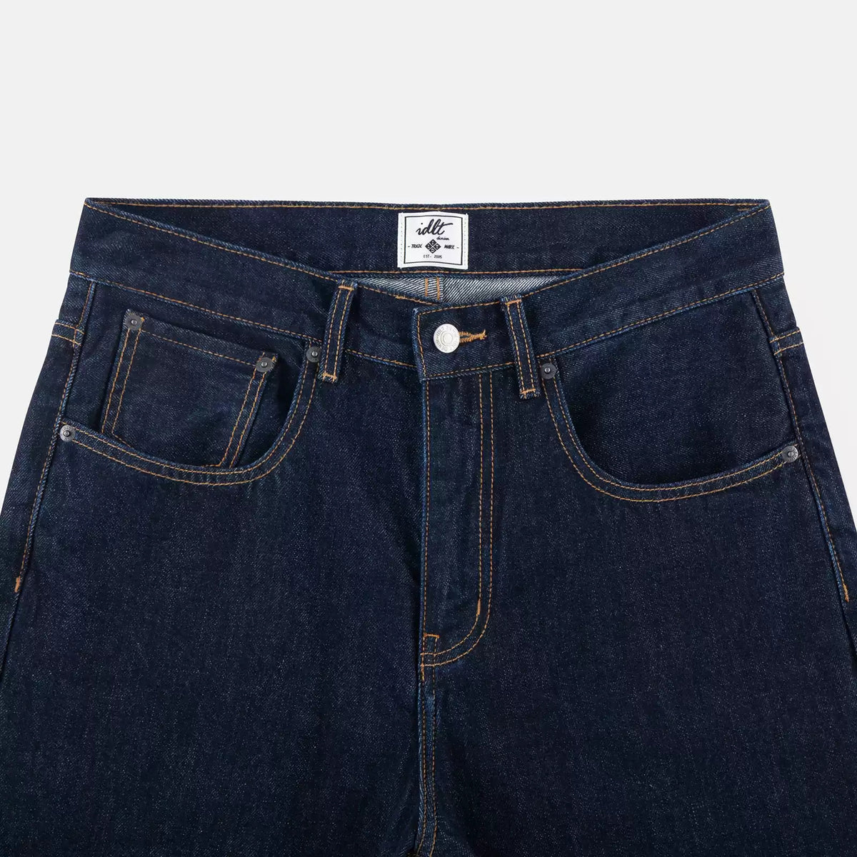 IDLT jeans, dark blue waistband overview.