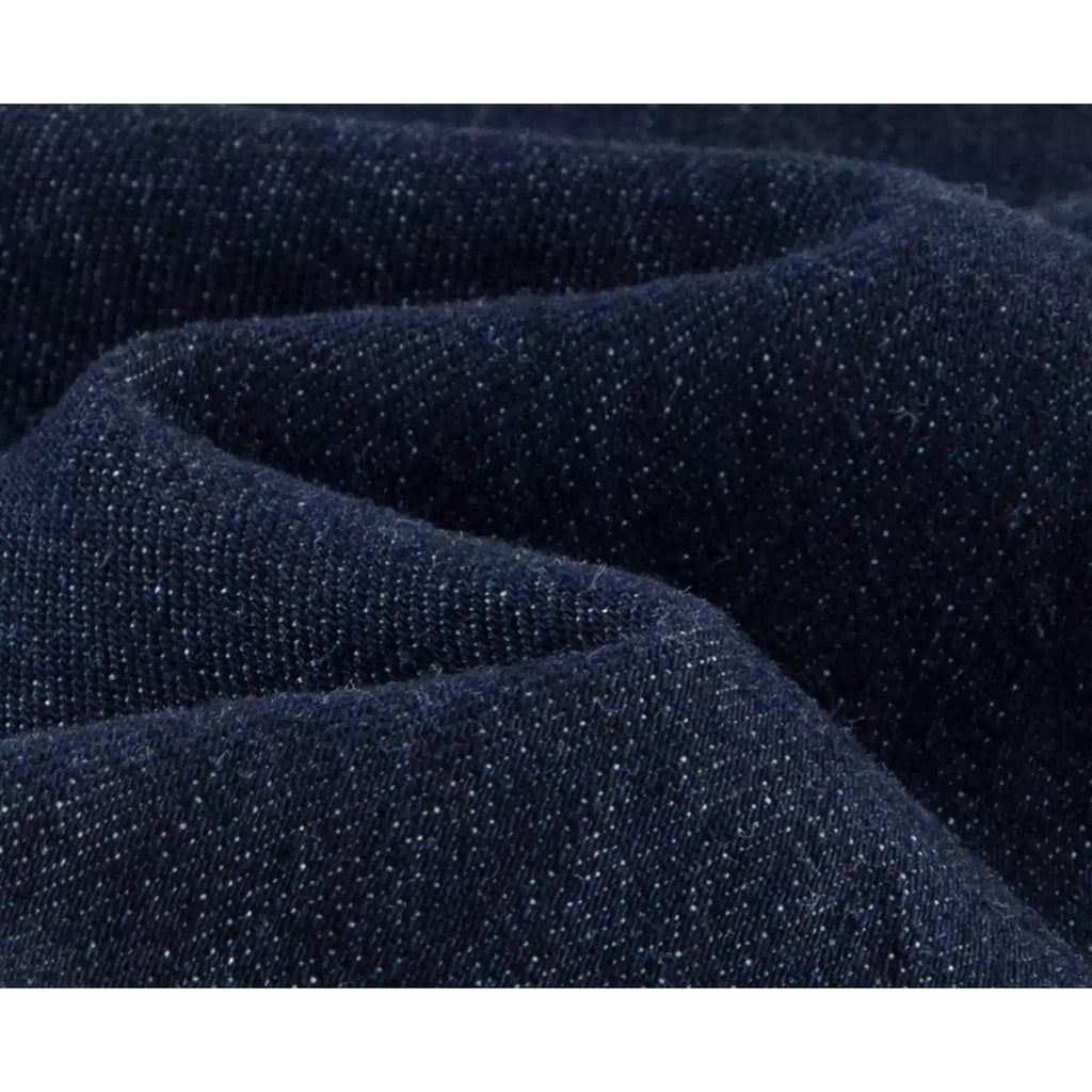 IDLT jeans, dark blue denim texture.