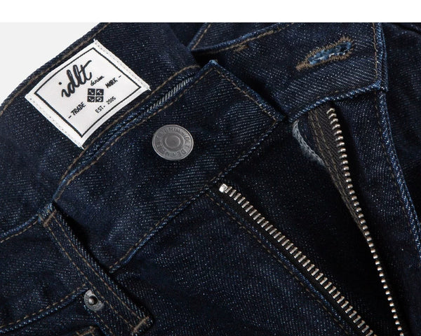 IDLT jeans, dark blue waist button and label.