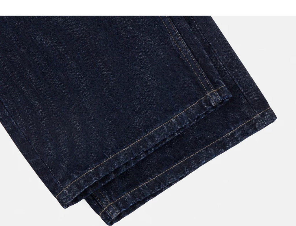 IDLT jeans, dark blue leg hems.