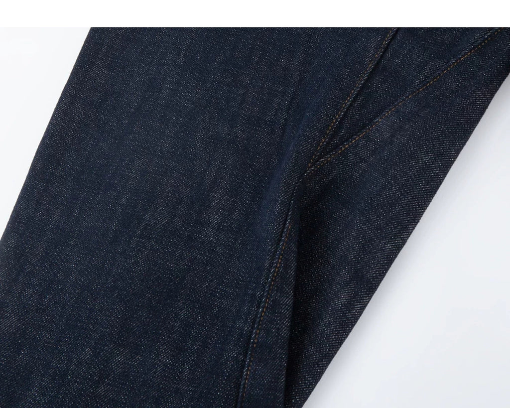 IDLT jeans, dark blue curved leg seam.
