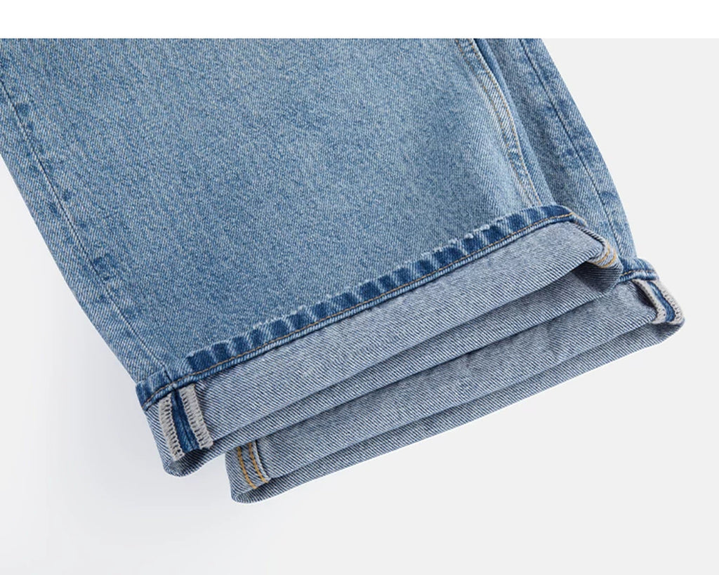 IDLT jeans, washed blue rolled hems.