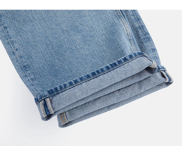 IDLT jeans, washed blue rolled hems.