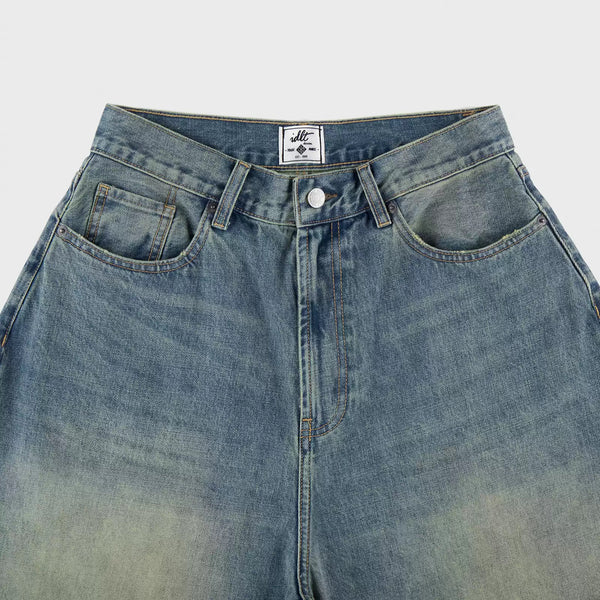 IDLT jeans, washed blue waistband overview.