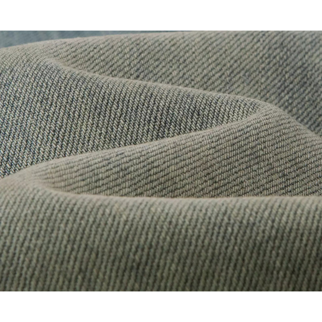IDLT jeans, washed denim texture.