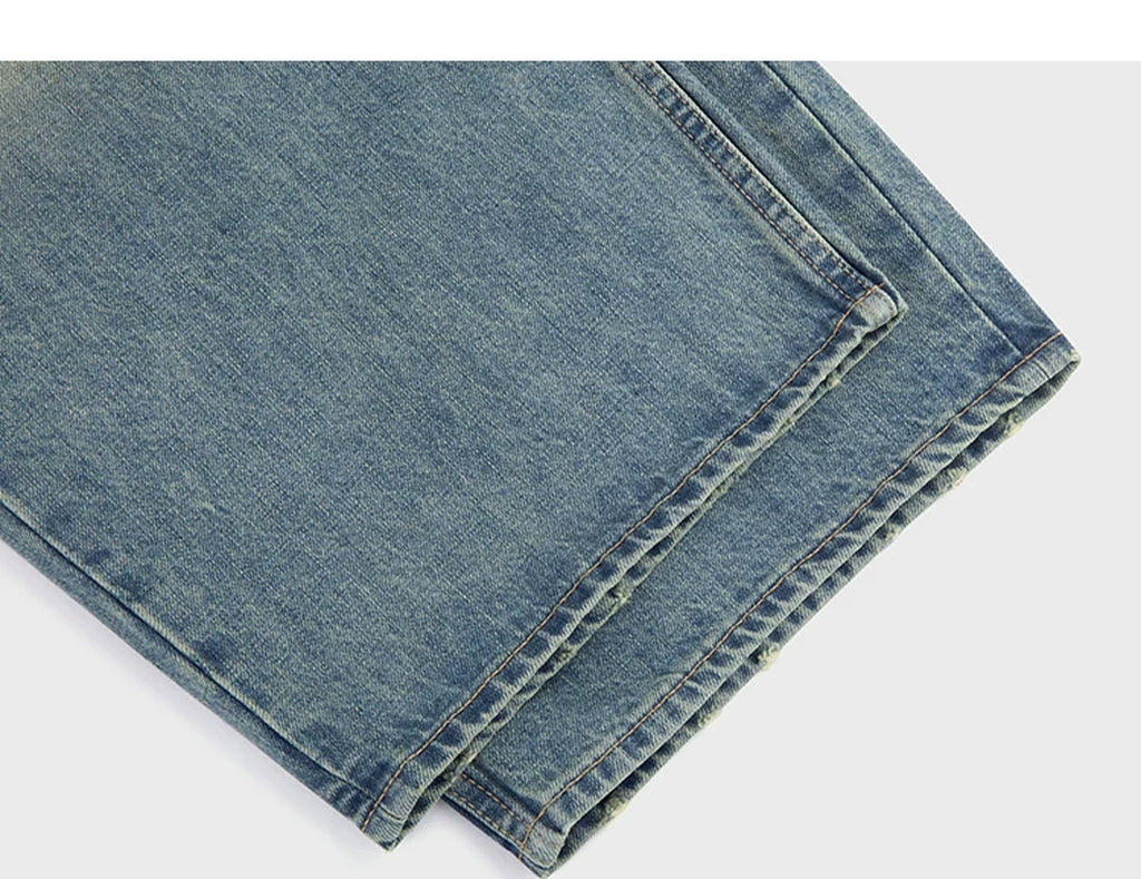 IDLT jeans, washed blue leg hems.