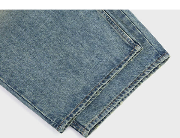 IDLT jeans, washed blue leg hems.