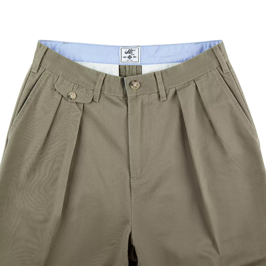 IDLT pleated trousers, khaki waistband and pleats.