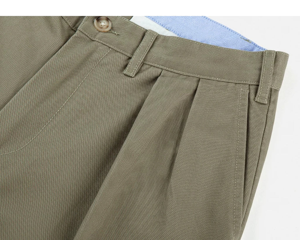 IDLT pleated trousers, khaki side pocket and belt loops.