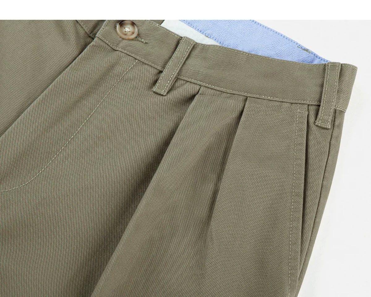 IDLT pleated trousers, khaki side pocket and belt loops.