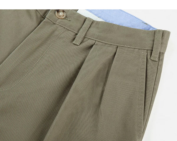 IDLT pleated trousers, khaki side pocket and belt loops.