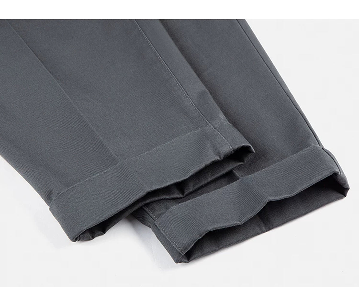 IDLT pleated trousers, gray rolled hems.