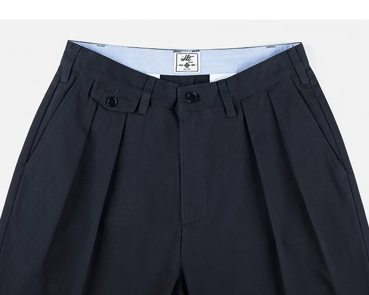 IDLT pleated trousers, navy waistband and pleats.