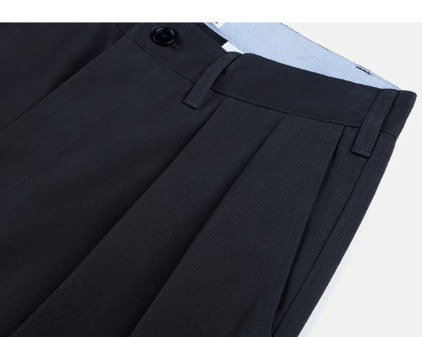 IDLT pleated trousers, navy side pocket.