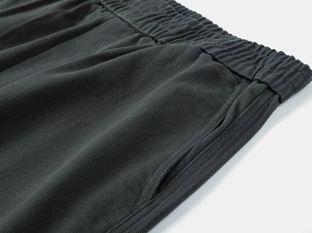 IDLT elastic waist trousers, dark gray side pocket.