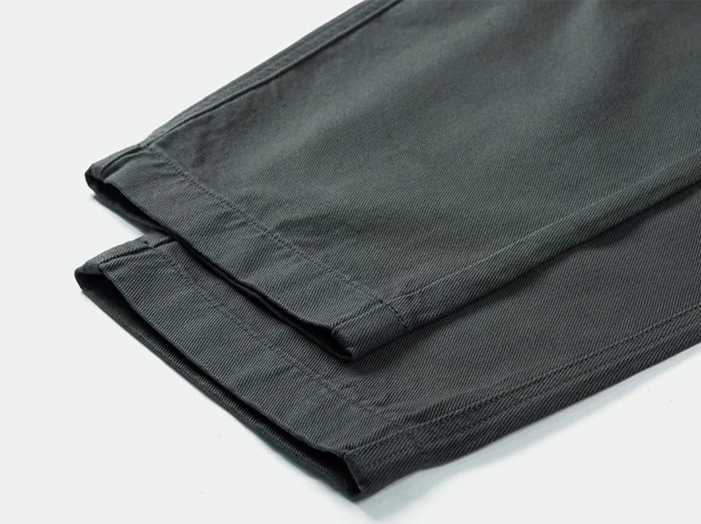 IDLT elastic waist trousers, dark gray leg hems.