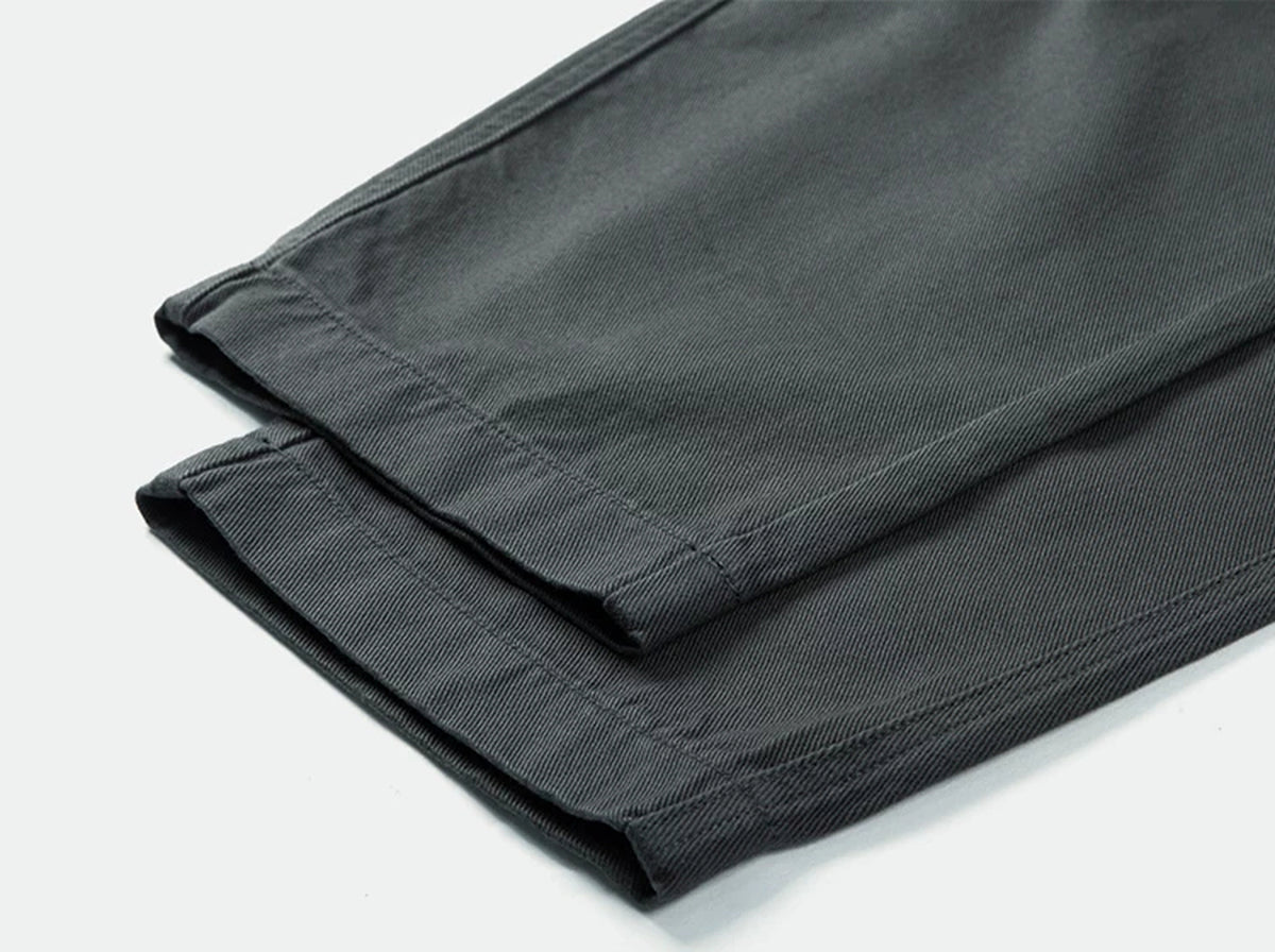 IDLT elastic waist trousers, dark gray leg hems.