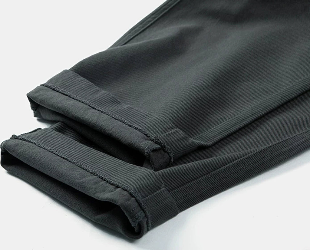 IDLT elastic waist trousers, dark gray rolled hems.