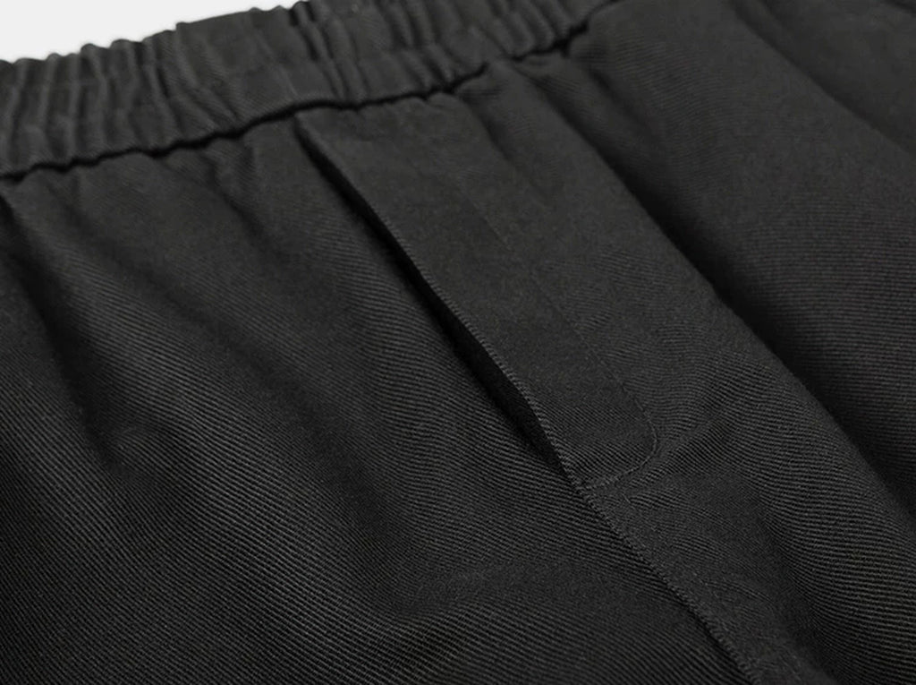 IDLT elastic waist trousers, black waistband stitching.