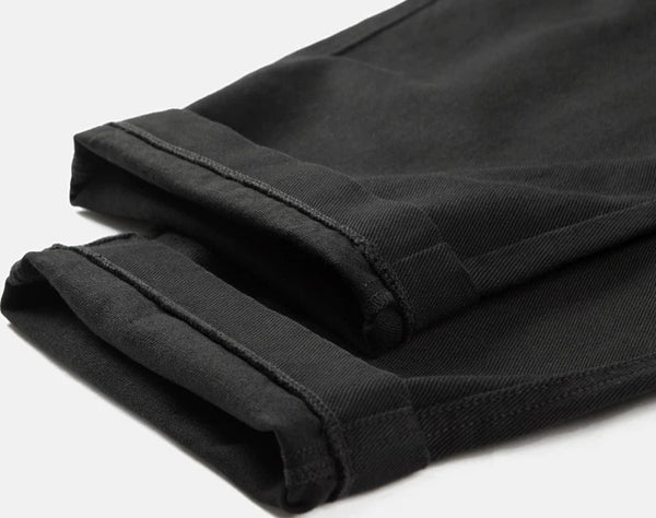 IDLT elastic waist trousers, black rolled hems.