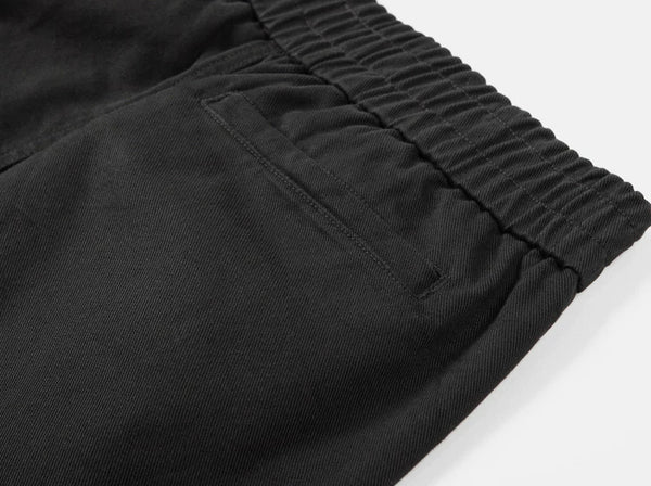 IDLT elastic waist trousers, black side pocket.