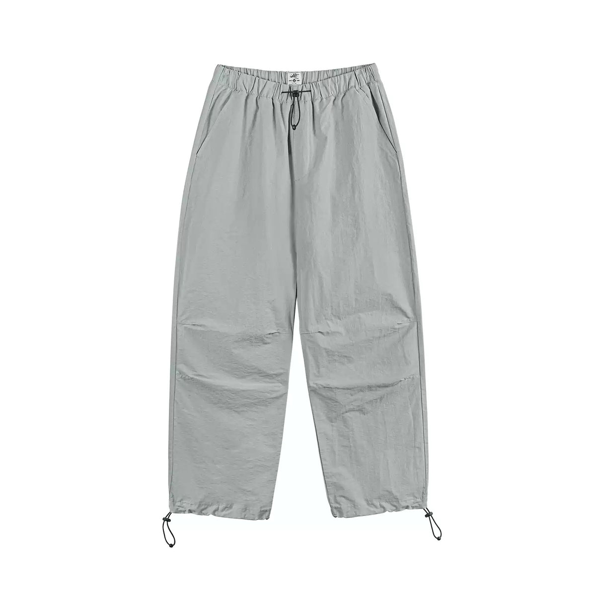 IDLT drawstring trousers, light gray front laid flat.