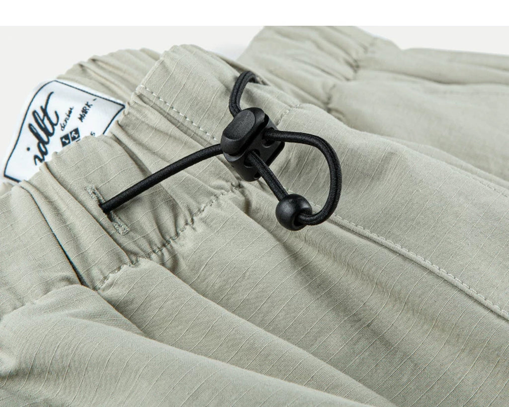 IDLT drawstring trousers, beige waist drawcord.