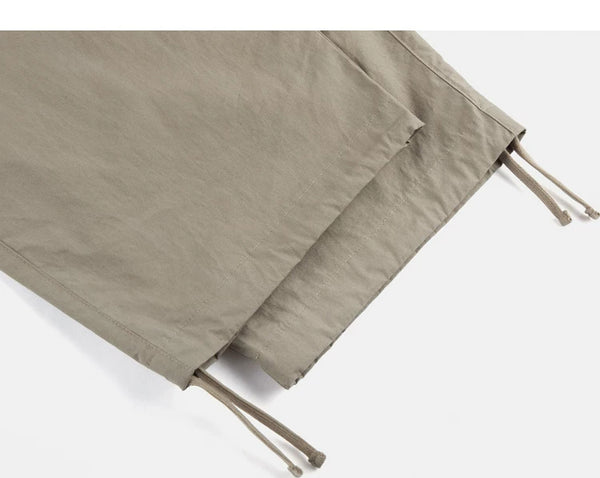 IDLT cargo pants, beige ankle drawstrings.