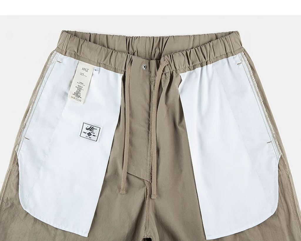 IDLT cargo pants, beige inner pockets.