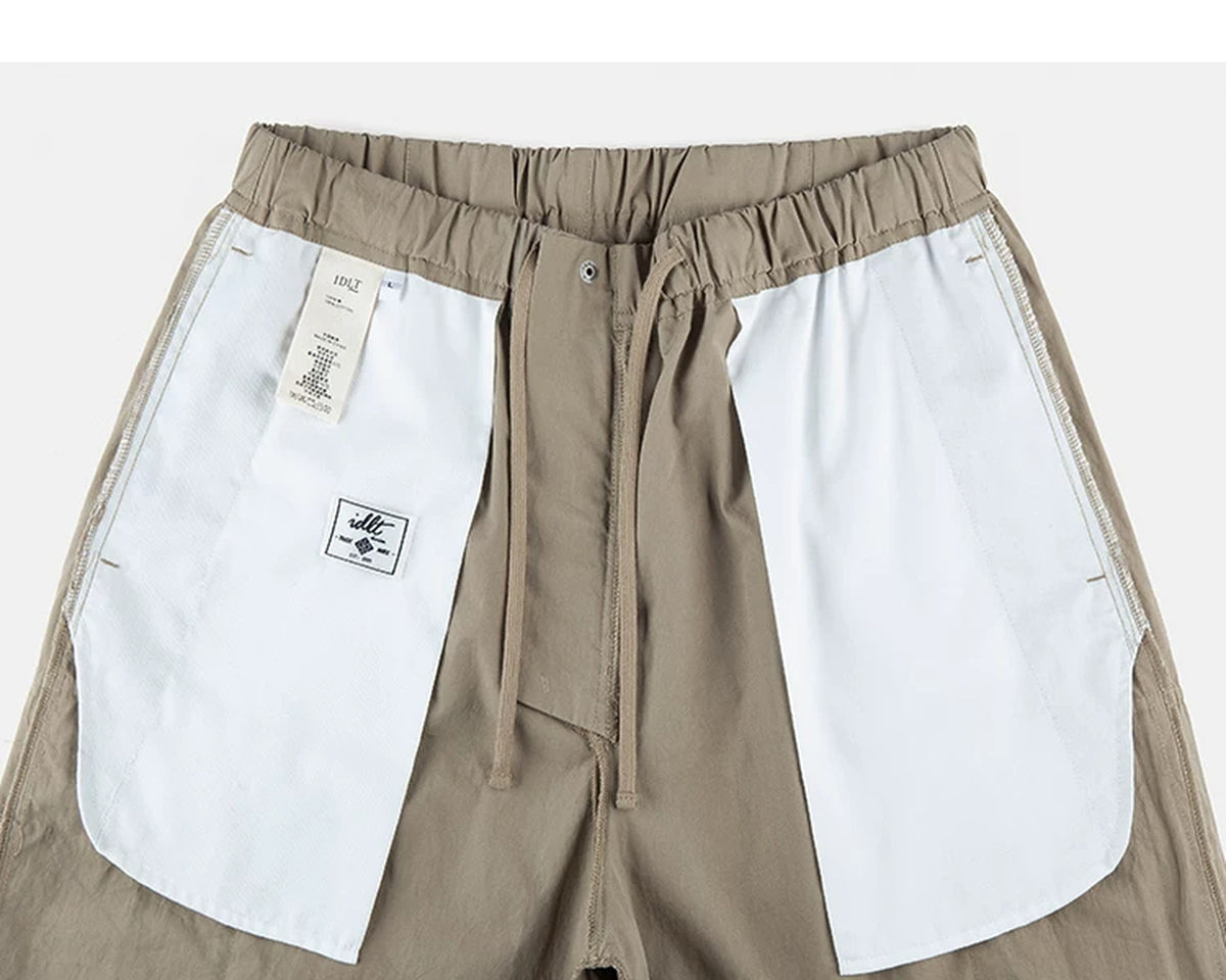 IDLT cargo pants, beige inner pockets.