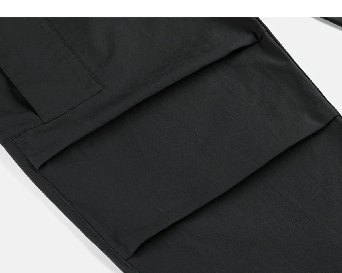 IDLT cargo pants, black knee pleats.