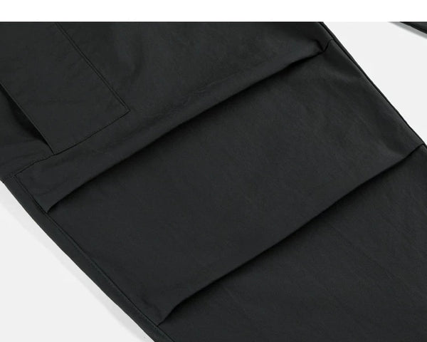 IDLT cargo pants, black knee pleats.