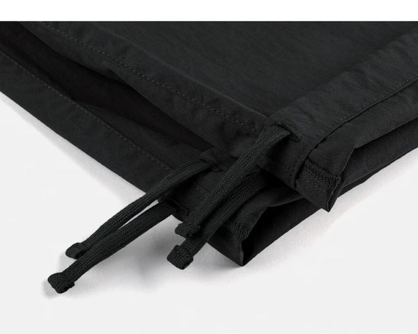 IDLT cargo pants, black ankle drawstrings.