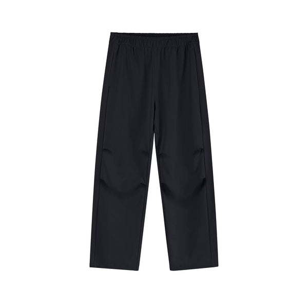 IDLT drawstring trousers, black front.