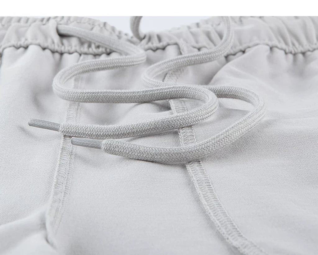 IDLT drawstring trousers, light gray inner drawstring.