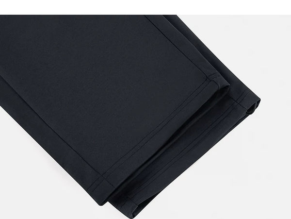 IDLT drawstring trousers, black leg hems.
