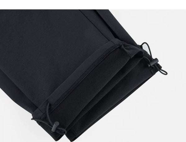 IDLT drawstring trousers, black ankle drawcords.