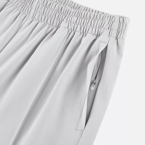 IDLT wide leg trousers, light gray zipped side pocket.