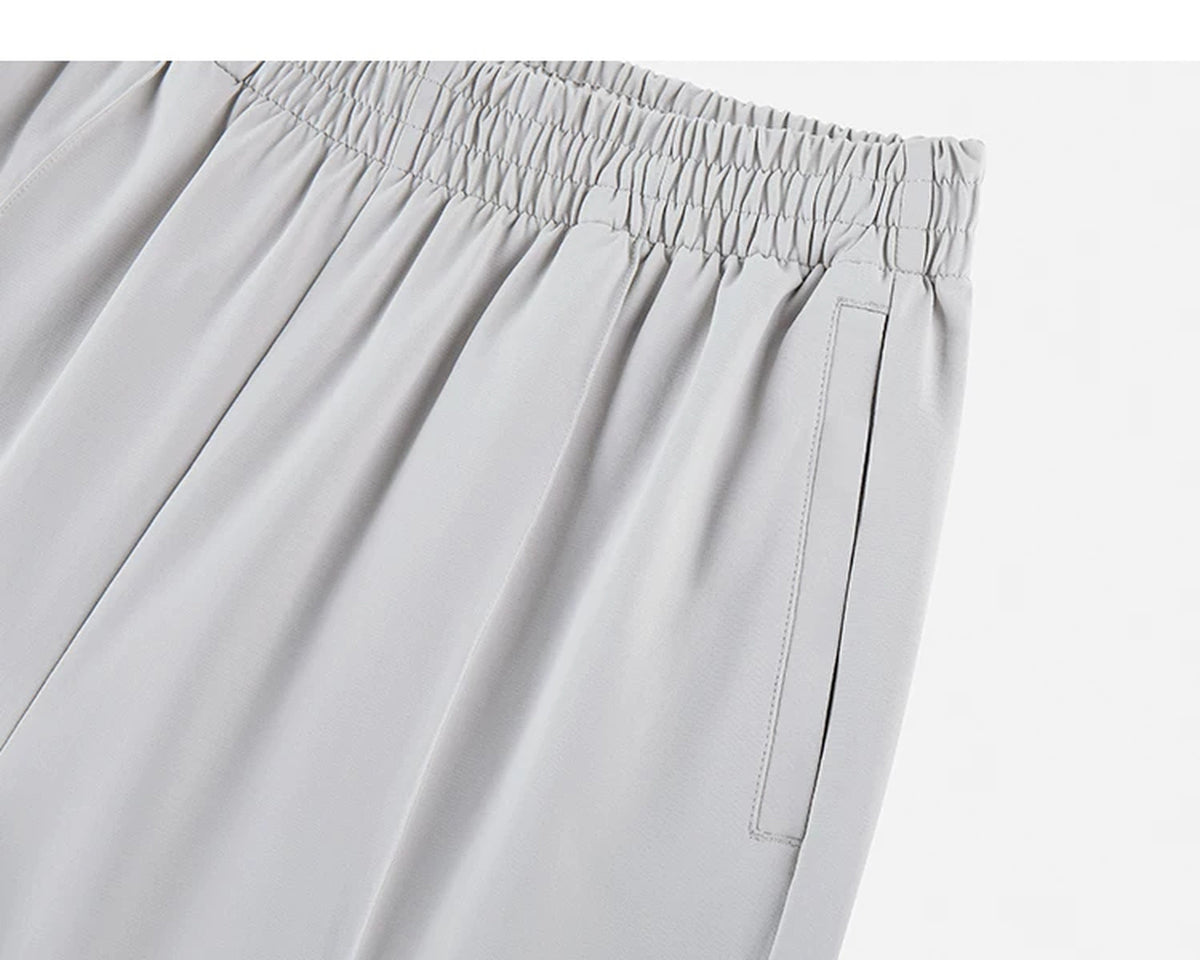 IDLT wide leg trousers, light gray closed side pocket.