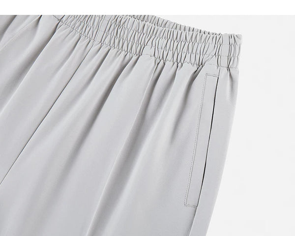 IDLT wide leg trousers, light gray closed side pocket.