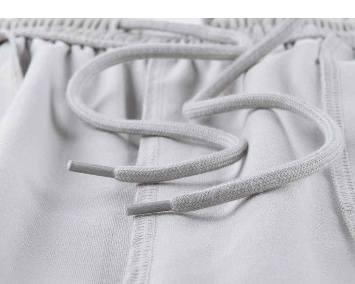 IDLT wide leg trousers, light gray inner drawstring.