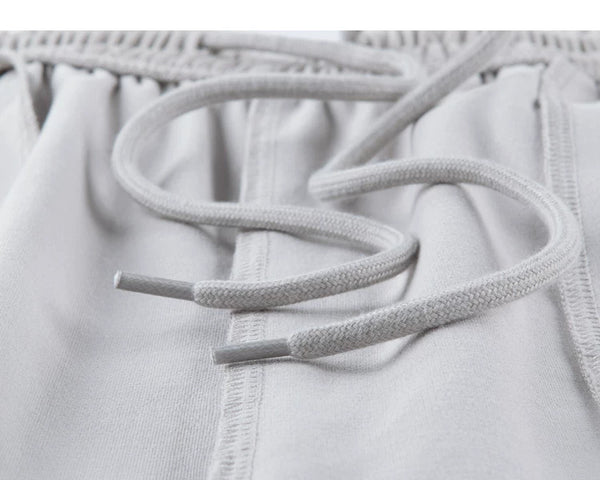 IDLT wide leg trousers, light gray inner drawstring.
