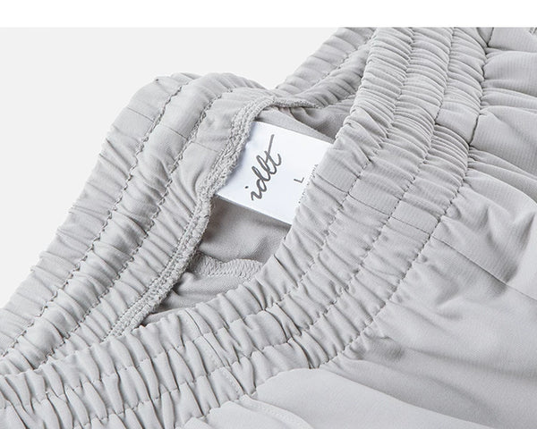 IDLT wide leg trousers, light gray waistband label.