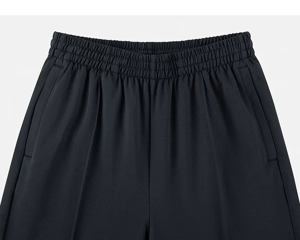 IDLT wide leg trousers, black waistband and pockets.