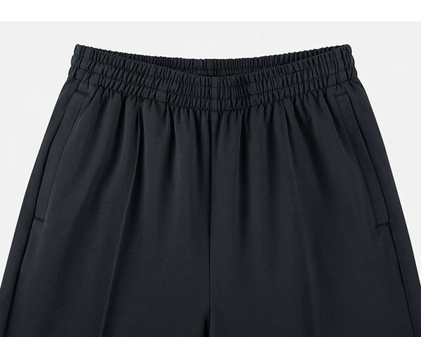 IDLT wide leg trousers, black waistband and pockets.