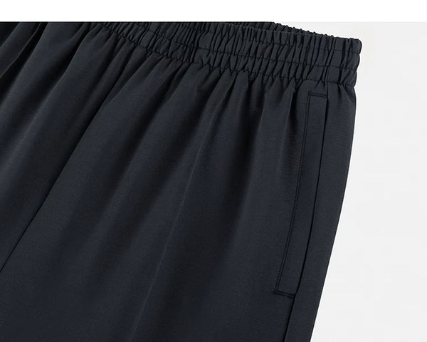 IDLT wide leg trousers, black closed side pocket.