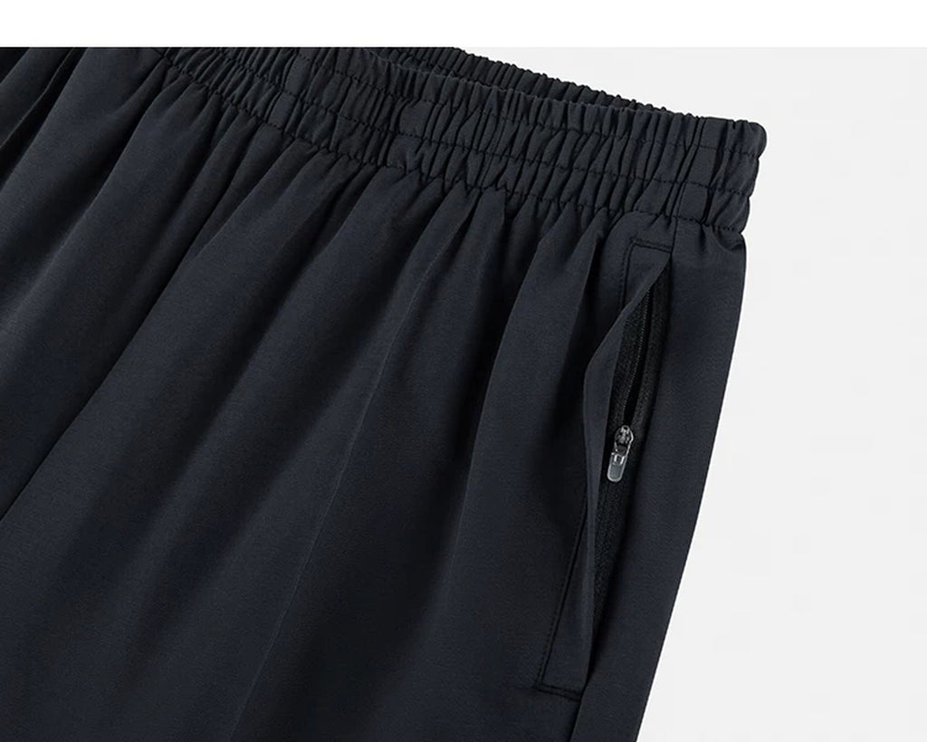 IDLT wide leg trousers, black zipped side pocket.