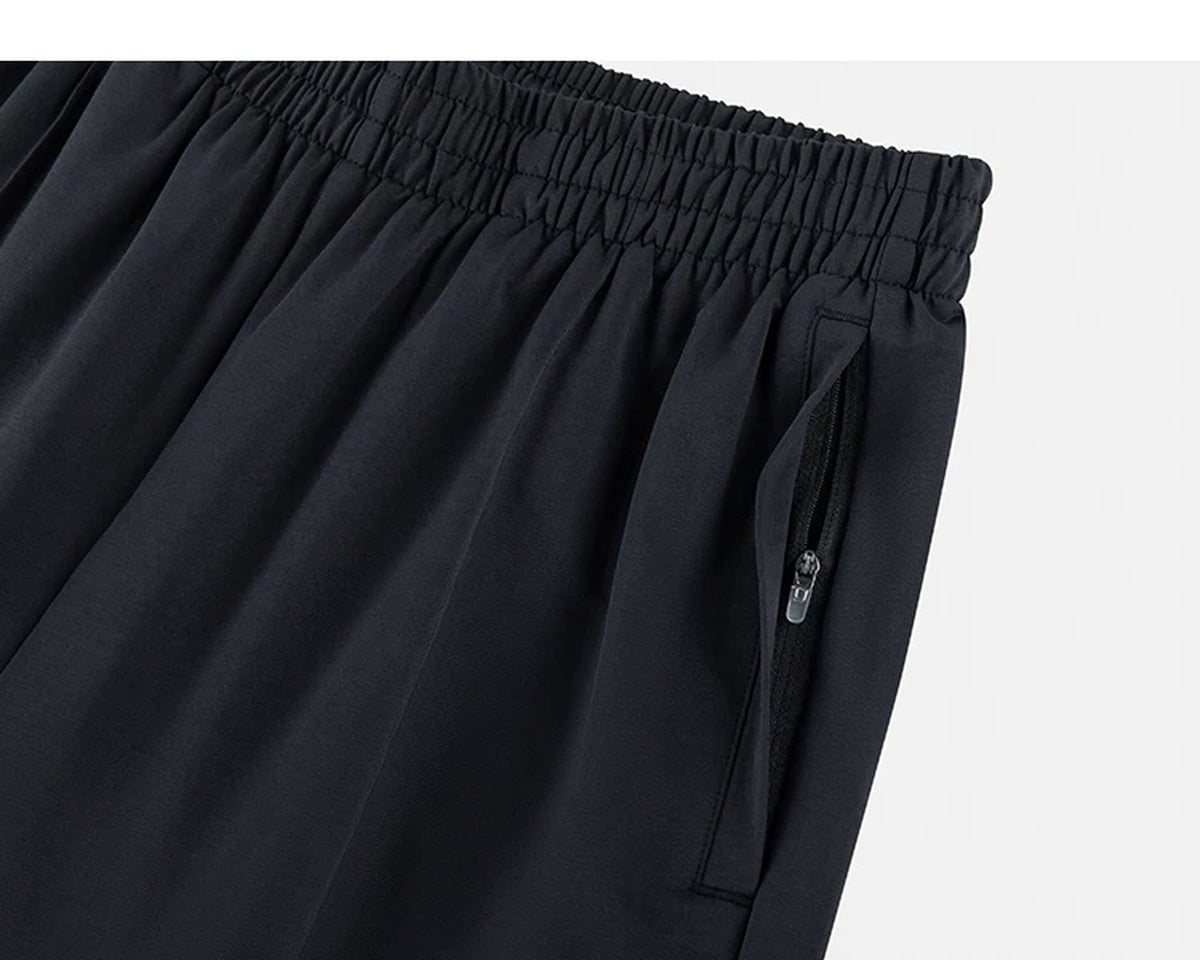 IDLT wide leg trousers, black zipped side pocket.