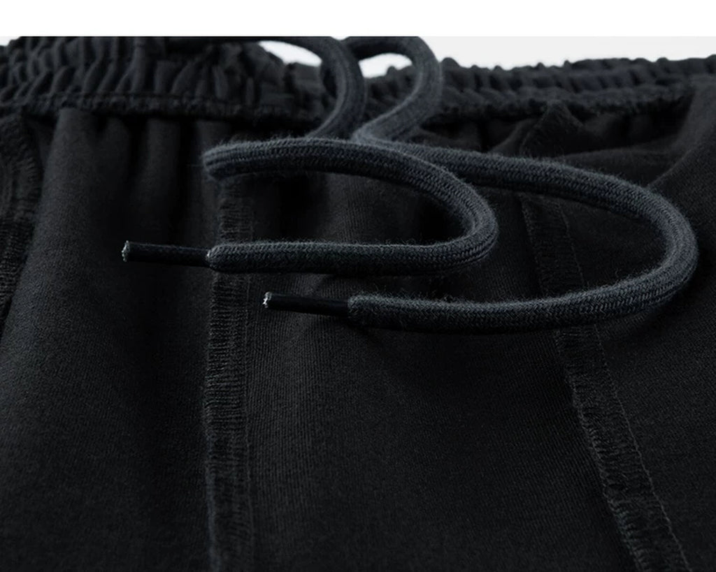 IDLT wide leg trousers, black inner drawstring.